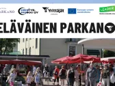 Eläväinen parkano-hankkeen kuvituskuva. kuvassa iloisia ihmisiä parkanon aurinkoisella torilla
